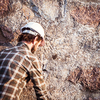 Highland Stone and Lime Conservation's David Clarke carrying out a stone building inspection