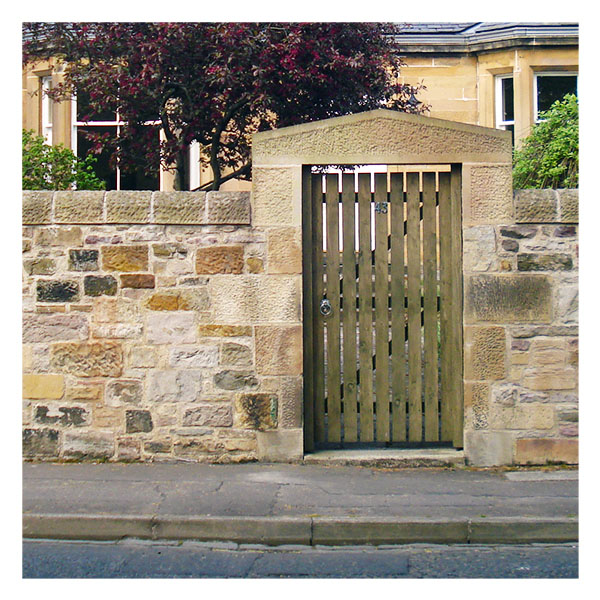 Stone wall and gate archway repair and re-pointing.